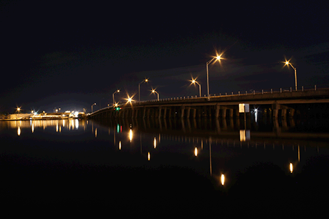 Cinco Bayou Bridge at night